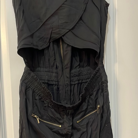 bebe Black Jumpsuit with Sleeveless Design and Tapered Legs - Picture 3 of 3